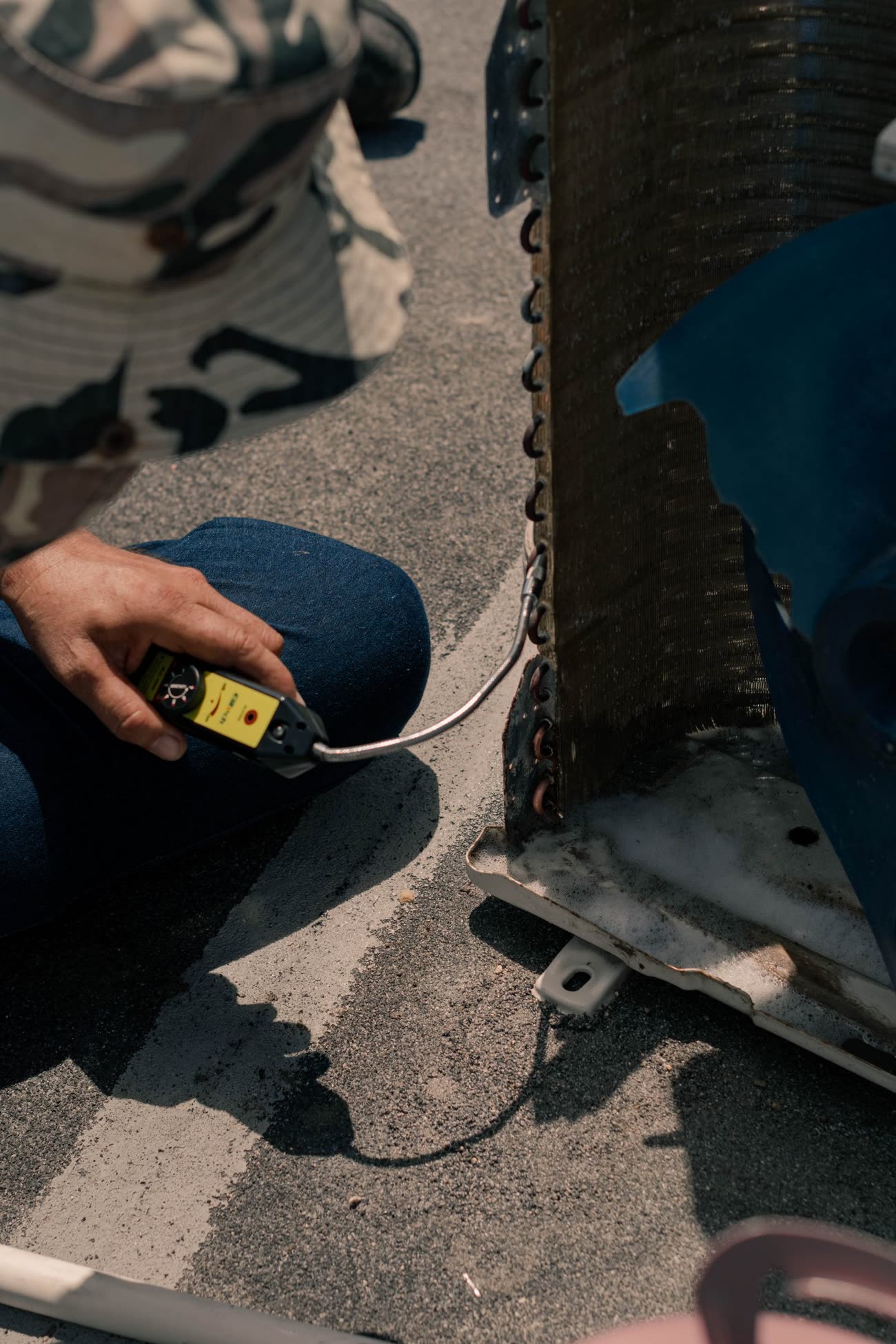 An HVAC technician checking a system